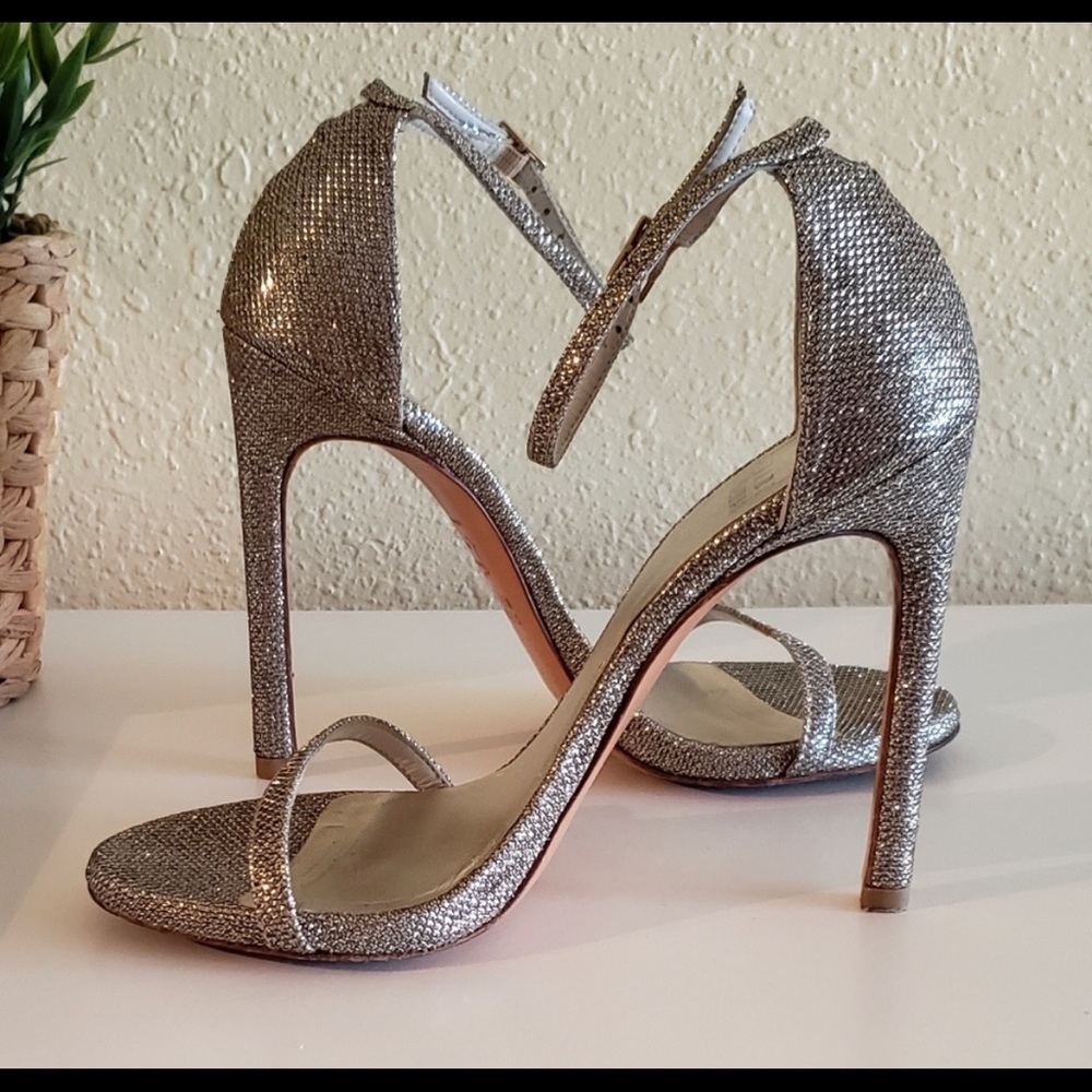 Stuart Weitzman Nudist Ankle Strap Heels Sandal in Platinum Noir, Size 6.